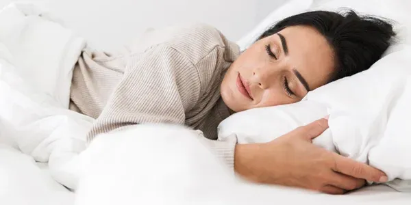 woman sleeping in bed bug free bed